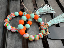Load image into Gallery viewer, Silicone Beaded Keyring Bangle With Tassel - 7 Color Options